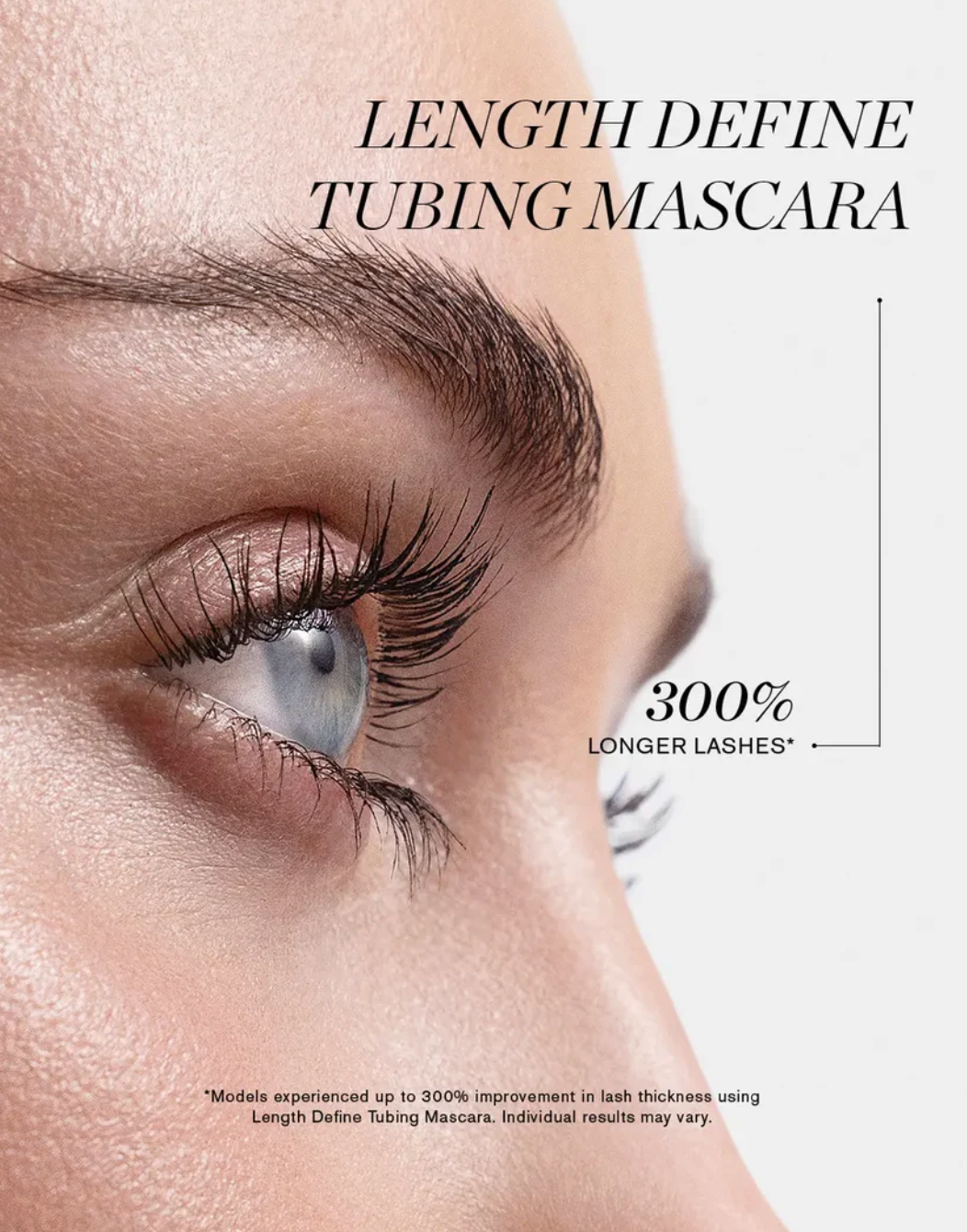 Close-up of a woman's eye wearing long, curled eyelashes, with text reading 'LENGTH DEFINE TUBING MASCARA' and '300% LONGER LASHES' on a clean white background.