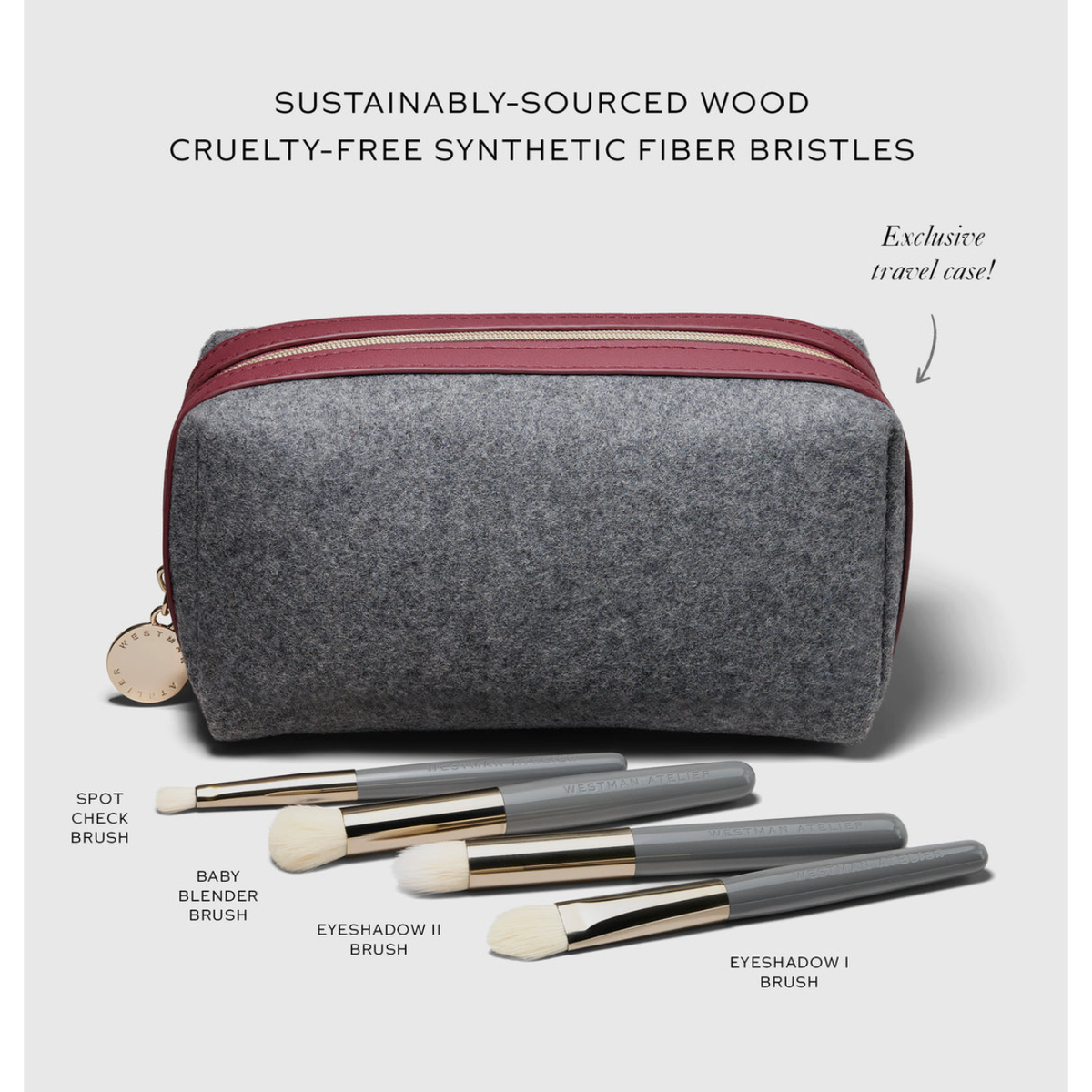 A gray felt makeup travel case with a burgundy zipper sits on a light gray background, with five makeup brushes arranged in front and text labels identifying each brush type. Text at the top reads 'SUSTAINABLY-SOURCED WOOD' and 'CRUELTY-FREE SYNTHETIC FIBER BRISTLES,' with 'Exclusive travel case!' written to the right.