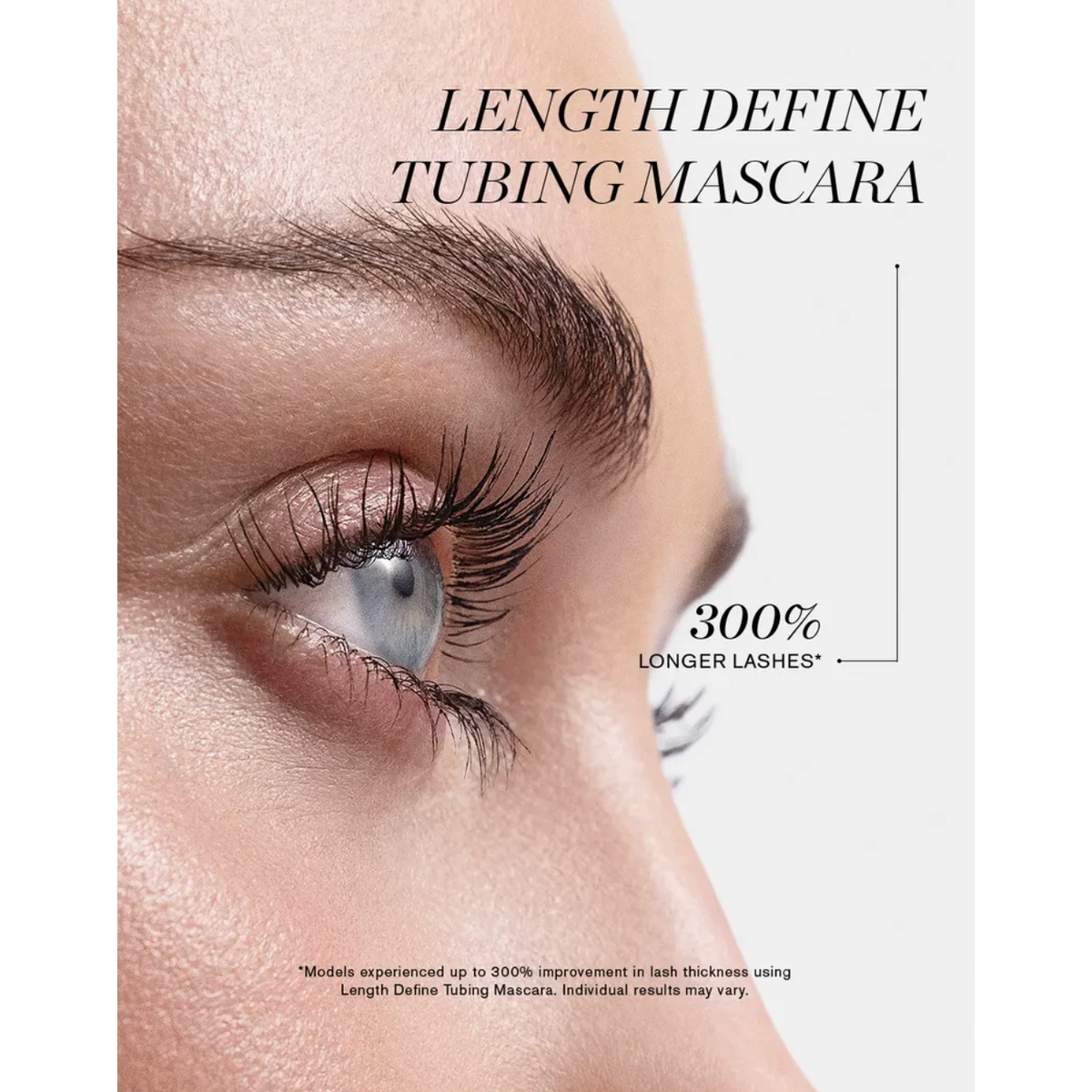 Close-up of a woman's eye wearing long, curled eyelashes, with text reading 'LENGTH DEFINE TUBING MASCARA' and '300% LONGER LASHES' on a clean white background.