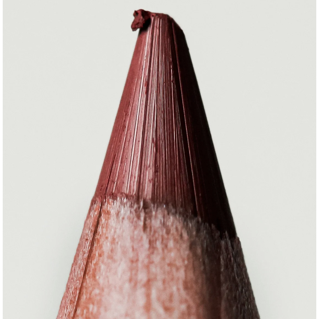 White back ground Liner tip colored is Bruised Rhubard, color burnt red