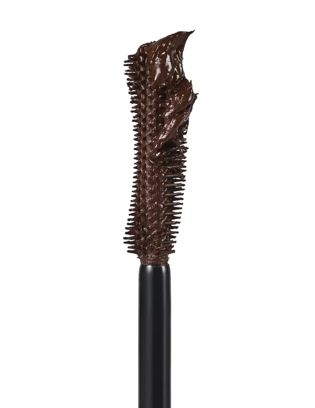 A close-up of a mascara wand showing a thick, glossy dark brown formula loaded with bristles, set against a solid white background.